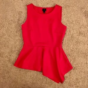 Asymmetrical peplum